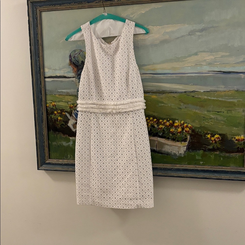 Lilly Pulitzer white dress/size damn. Worn for a graduation.